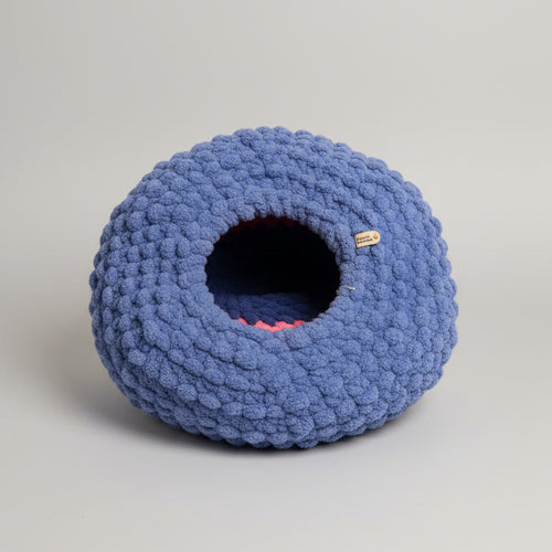 A pack shot of a blue cat cave