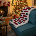 A photo of a christmas throw with an AI generated living room during the holidays
