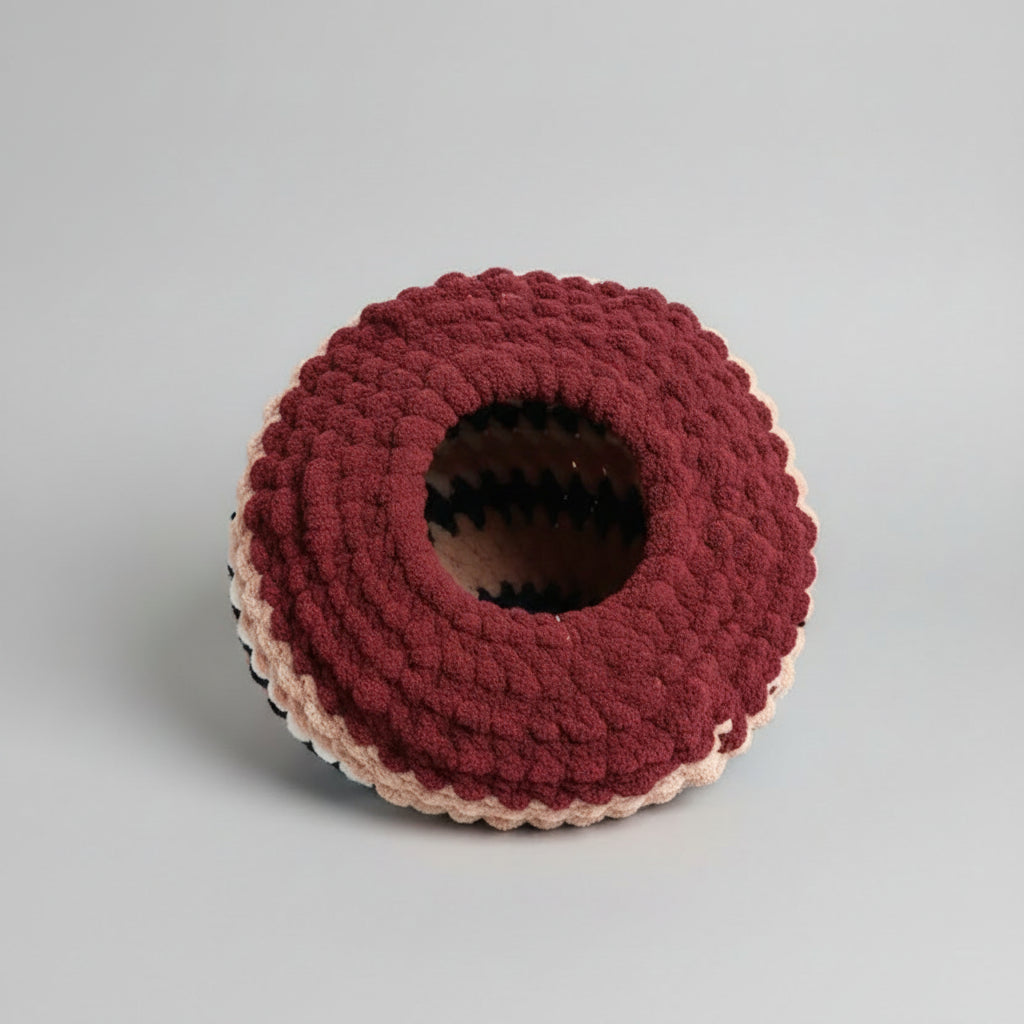 A pack shot of a maroon cat cave for medium cats
